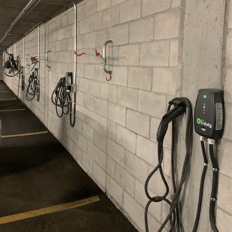 ev duty level 2 chargers mounted on a wall