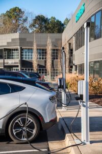 Cars parked at a public EV charging station in ottawa.